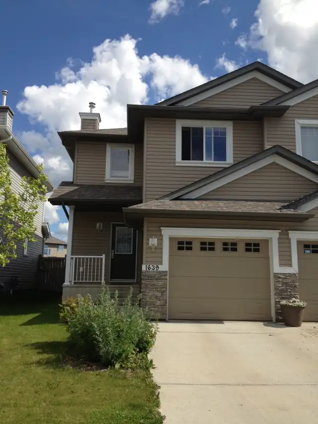 Absolutely Gorgeous 1700 sqft Duplex with POND FRONT & GREENBACK