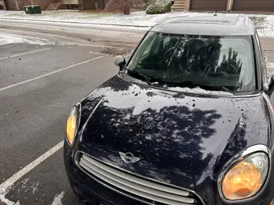 2011 Mini Cooper Countryman sold As-is Automatic but has paddle shift option Engine is in good condi...