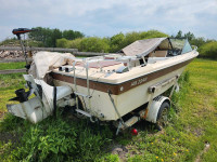18 foot boat and trailer.