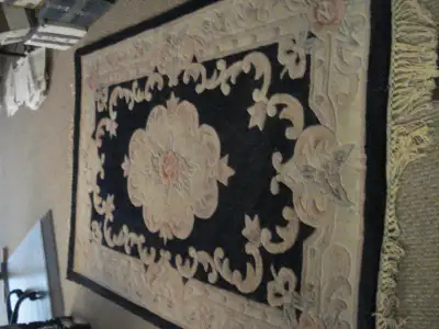 This beautiful Sea Gull rug handcrafted Chinese carpet (72" x 48") features a classic floral design...