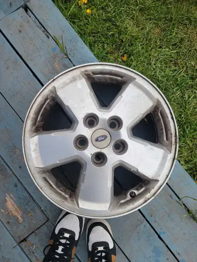 4 rims - ford escape came off a 2011 ford escape. Rim size 16". Good condition. 2 of the rims have t...