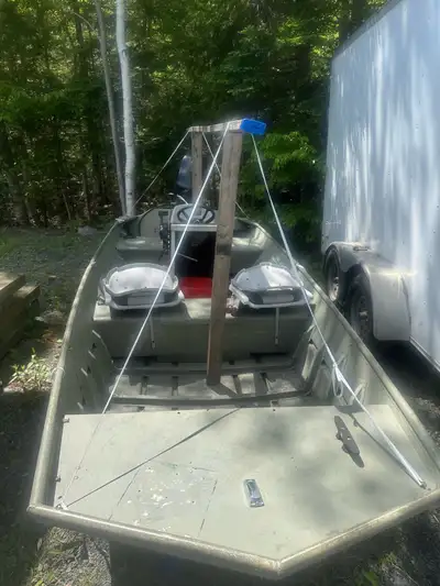 16 ft Jon boat and a 25 hp mercury 4 stroke . Priced to sell as no longer needed and moving . No tra...