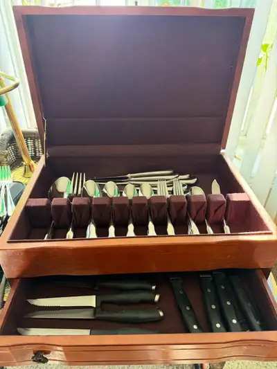 Rosalco Commodore Collection flatware set features a timeless design, housed in an elegant wooden st...