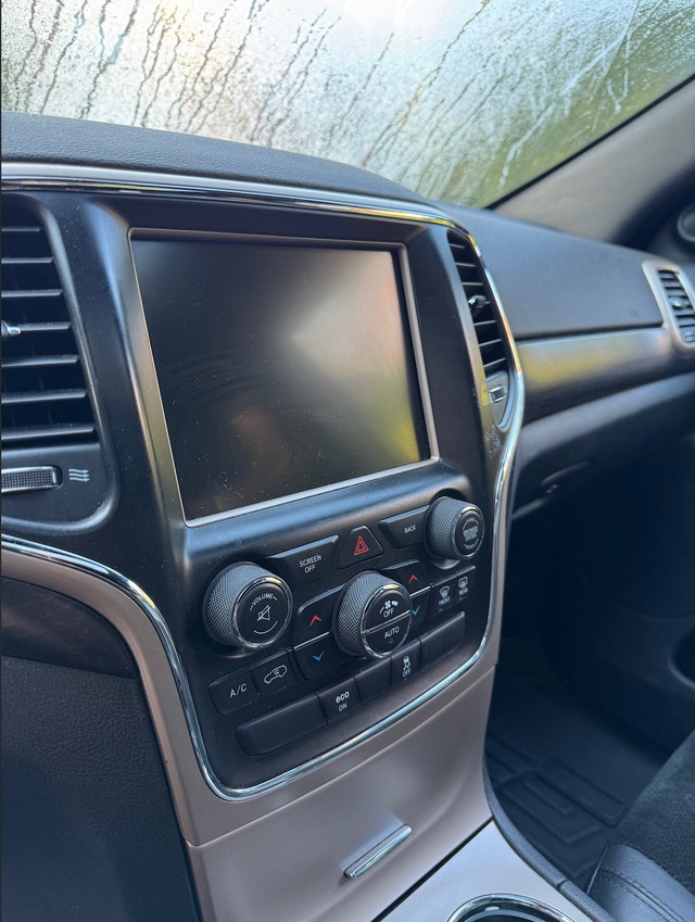 2015 Jeep Grand Cherokee Altitude — photo 2
