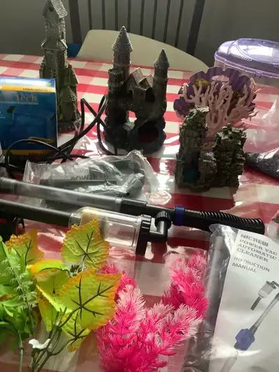 Aquarium accessories Take all for $30 as is. Located in North Sydney Phone 902-322-5295 for inquirie...