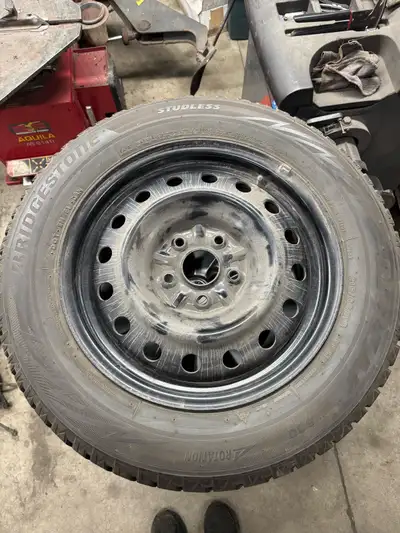 Set of four Bridgestone Blizzak winter tires on rims. Date code 2018, but have been in heated storag...