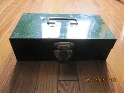 Nice old Justus cash box. Made in Smiths Falls Ontario. Dimensions L 11.25", W 6", H 3.75". No key.