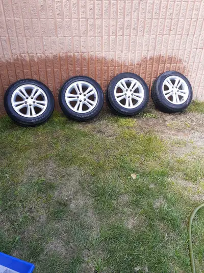 Tires 205/55R16, all season with wheel sensors, and Crome Nuts, Bolt Pattern 5-105, Center Bore (Hub...