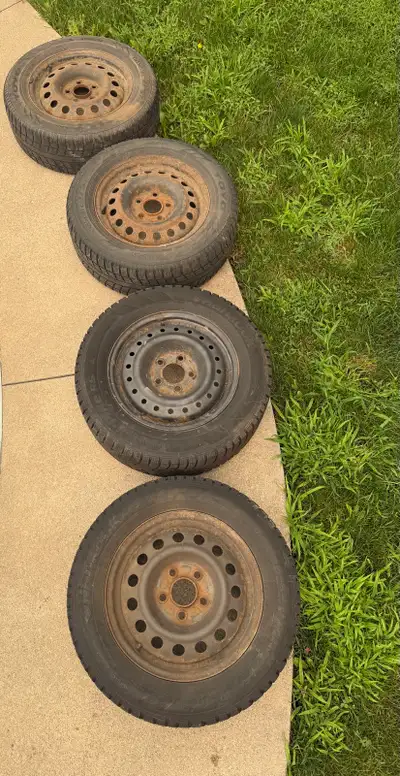 Set of 4 winter tires and rims available. Two tires are newer than the other two. Two winter ipike a...