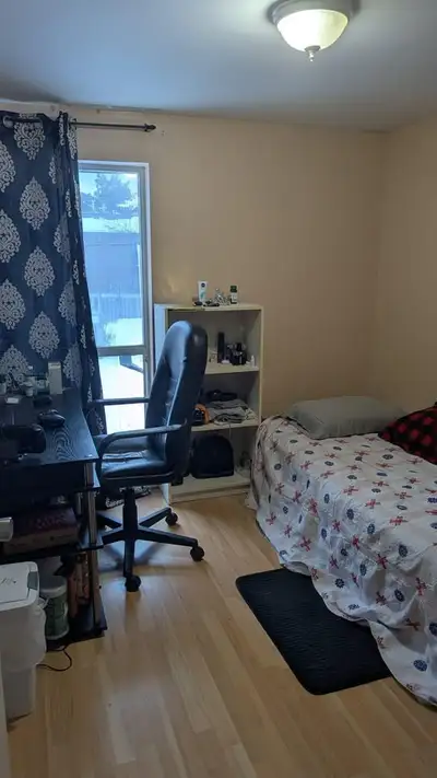 Private bedroom upstairs with window view. Shared washroom and kitchen. semi furnished. Available im...