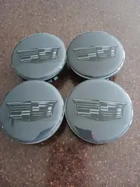 Cadillac wheel center caps (brand new)