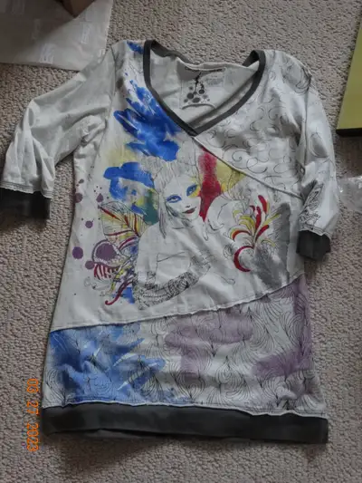 I think one of a kind, Looks hand designed. Made in MOrocco. Cirque du Soleil teeshirt sold at the C...