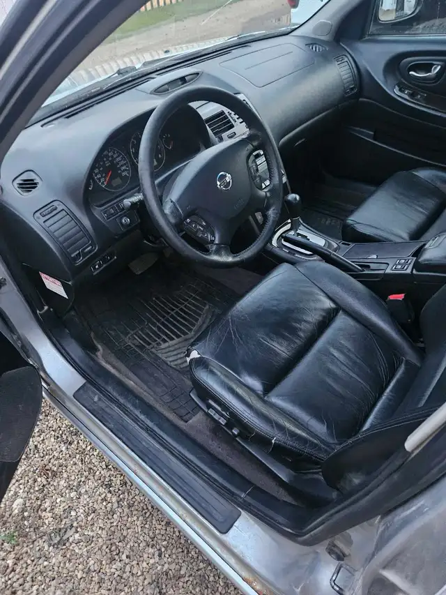 2003 Nissan Maxima 557469098731776007