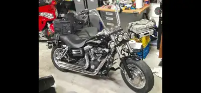 Selling my 2010 Fat bob . In very good condition with a ton of extras . 16 apes . Quick detach winds...