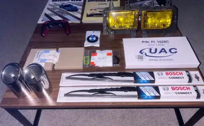 BMW E30 parts: - fog lights - sold - light switch assembly $50 - brand new wipers $20 - brand new sh...