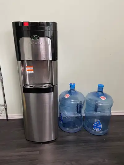 Water dispenser with two water bottles only sale $100. Very new and very nice.