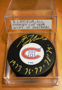 Autographed GUY LAFLEUR Montreal Canadiens Team Logo Pucks !!!