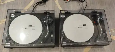 Great condition Technics SL-1200MK2 black pair of direct drive turntables. Includes dust covers, 45...