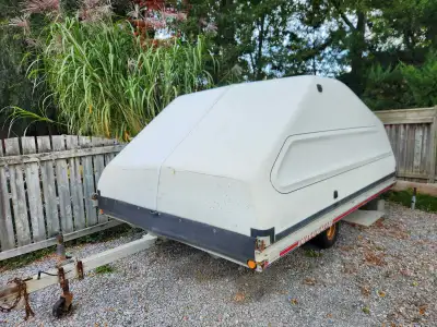 12 foot aluminum trailer with fiberglass top. Tires are good and lights all good. Road ready
