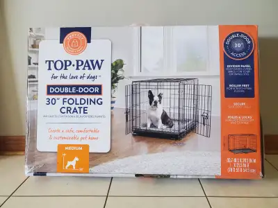 Top-Paw 30" Folding Dog Crate with double doors suitable for small to medium sized dogs. We only use...