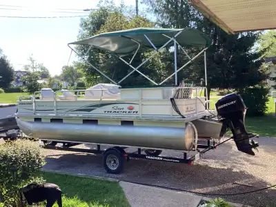 Recent new top and shore ladder. 50hp Mercury 4 strok. Runs excellent. No issues. Had a full service...