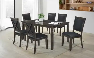 Upgrade your dining room with this elegant dining table and chairs set, featuring a sturdy build and...