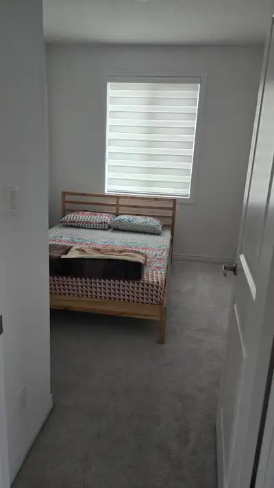 Very clean Room available for rent at monthly. House is shared with a couple.