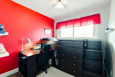 Twin bed with built-in dresser, desk, and stairs, View more