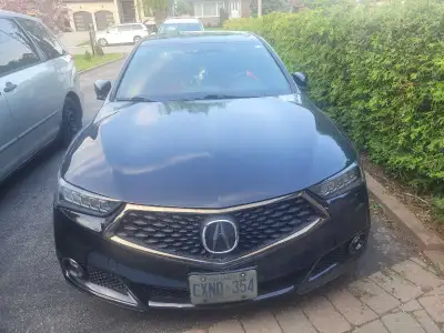 I'm selling my 2020 Acura TLX with a rebuilt title with only 118,750 km, a sleek and stylish sedan t...