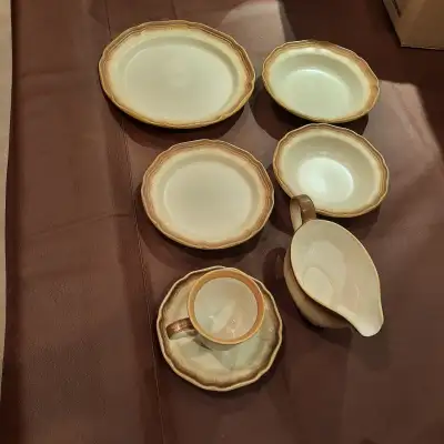 Full set of dinner plates, bowls (large and small), small plates, teacups, saucers, gravy boat, 2 se...