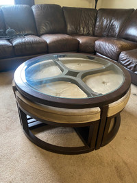 Round wood and glass coffee table.
