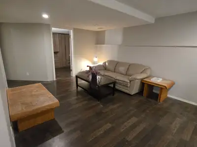 Large furnished basement suite with separate entry, storage, laundry and large windows. All utilitie...