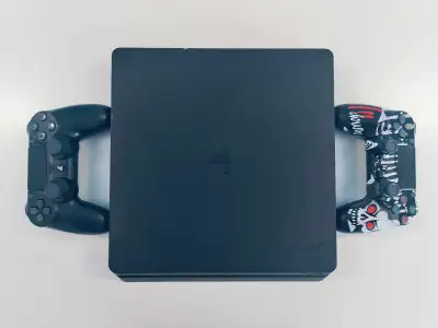 PS4 Slim 1 TB with 2 Controllers and Games, View more