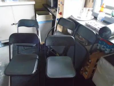 for sale 5 brand new foldable black chairs., View more