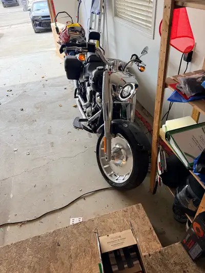 I'm selling my used 2021 Harley Davidson FLFBS Fat Boy 114 in sleek black, a true head-turner with i...