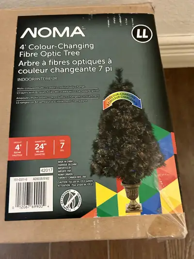 Noma Christmas tree in fibre optic lights and 4 change colours for $60. It comes in standing base an...