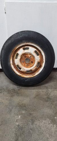 13'' all season P165/80R13 tire with rim.