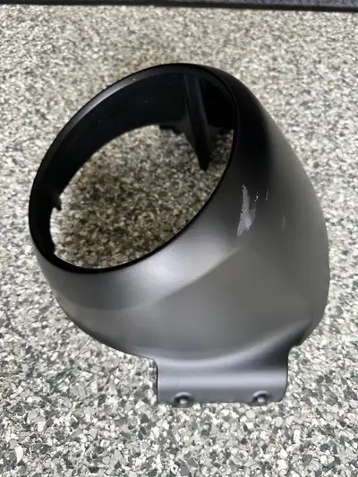 Selling an Indian Scout Bobber headlight cover. A couple of scratches as you can see in the photos b...