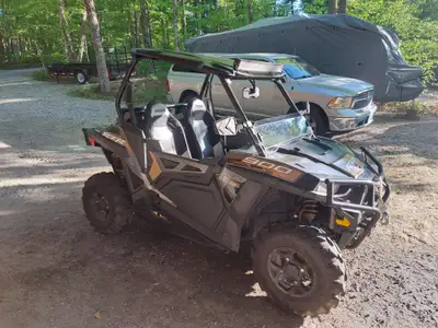 Get ready for your next off-road adventure with this well-maintained, pre-owned Polaris RZR Trail 90...