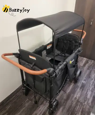 Brand new and sealed! The BuzzyJoy Quad Wagon fits up to 4 kids and is loaded with features for comf...