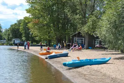 1000 feet of beautiful beachfront Mountainview Cottage Resort on Golden Lake. Great swimming and; fi...