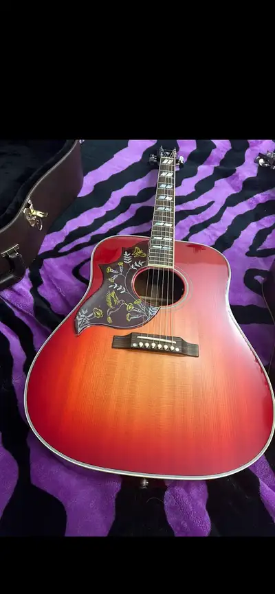 I have 2 of these stunning guitars but one must go . These are special order and over $6000 with tax...