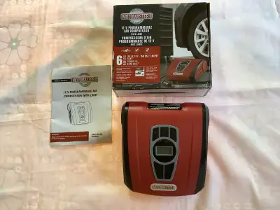 Brand new never used 12 v programmable air compressor with light