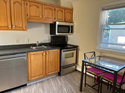 SUMMER RENTAL SPACIOUS TWO BEDROOM ... large and bright top floor living room, spacious kitchen, ful...