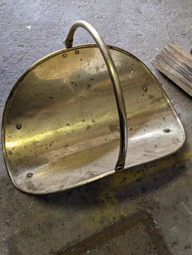 Used brass firewood holder with carrying handle $20