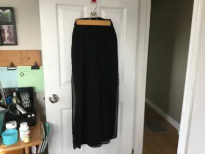 I have a pair of Pallaso Pants size 8 with two chiffon overlay panels on front and two on back to ma...
