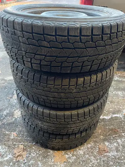 Set of 4 winter tires on Nissan oem rims Yokohama IceGuard Winter tires. 205/60R16 4x100 bolt patter...