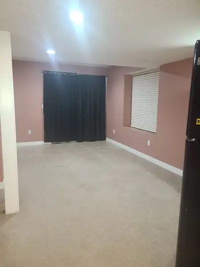 Bright and spacious basement suite available for rent in the quiet and family-friendly Panorama Hill...