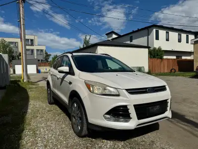 Hello I am selling my 2013 Ford Escape it runs and drives amazing engine and transmission perfect it...