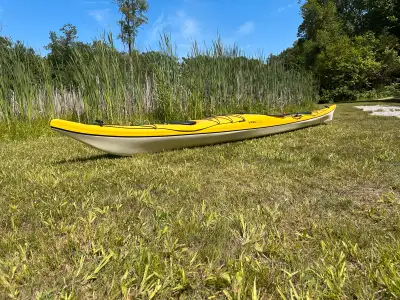This kayak retails for $3300+ and would be for intermediate or advanced kayakers. It has some scratc...